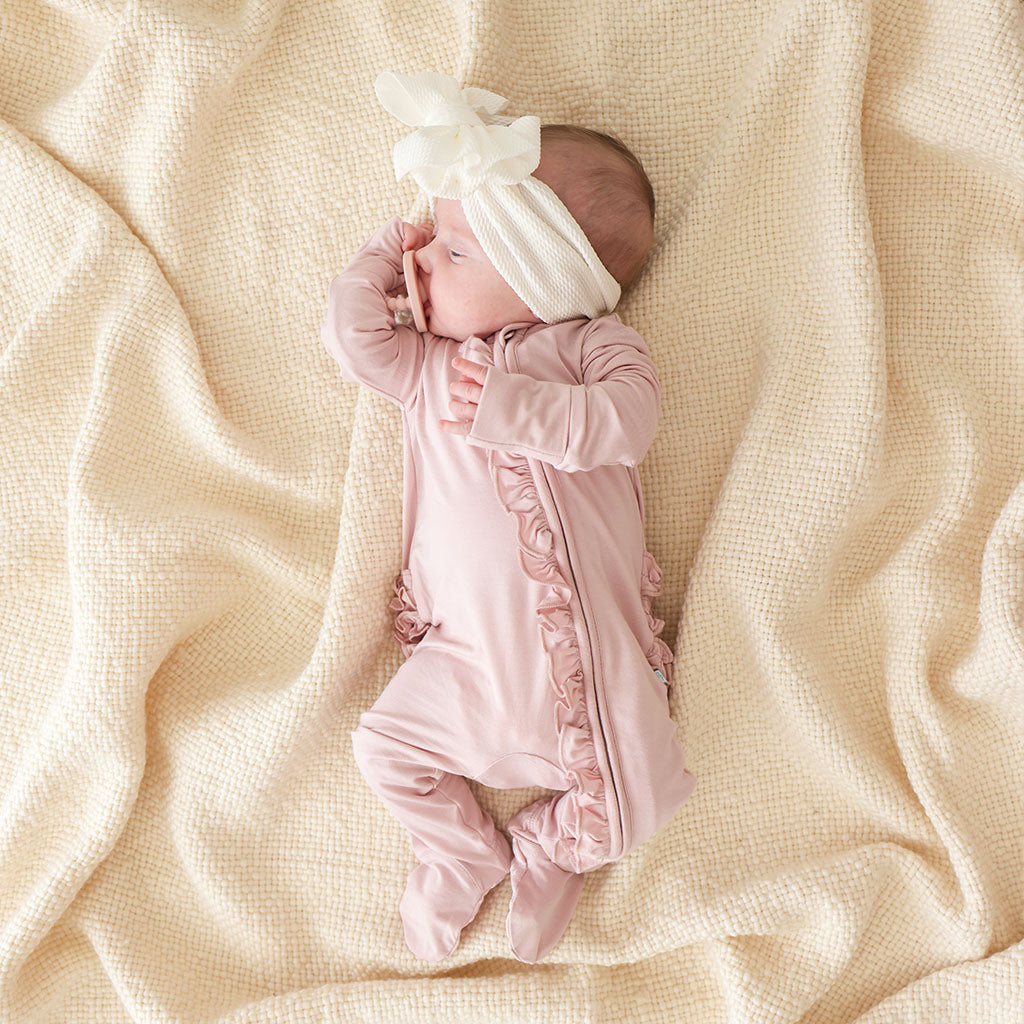 Delaney Blush Footie Ruffled Zippered One Piece