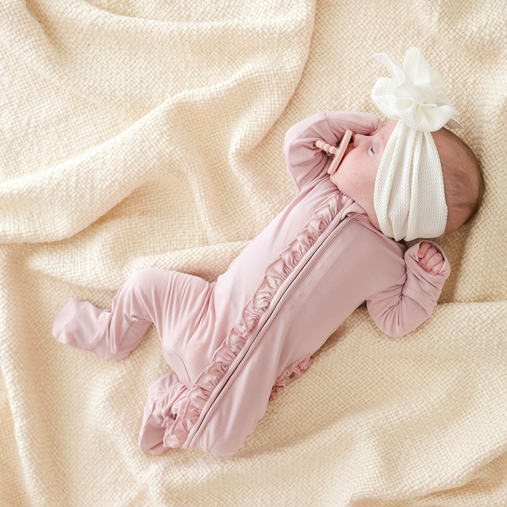Delaney Blush Footie Ruffled Zippered One Piece